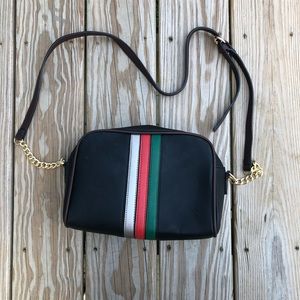 Striped black shoulder bag